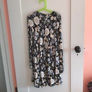 Black kids dress with pink and yellow flowers.